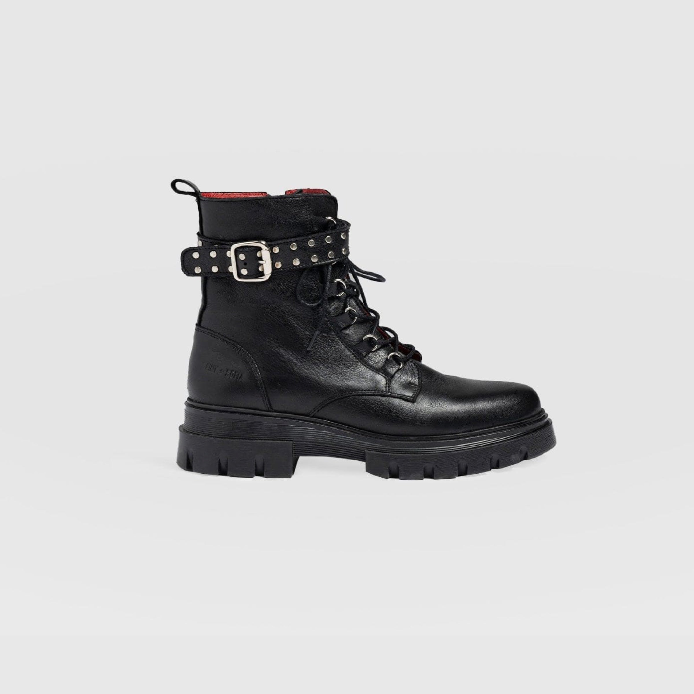 Black combat boots with 2025 studs