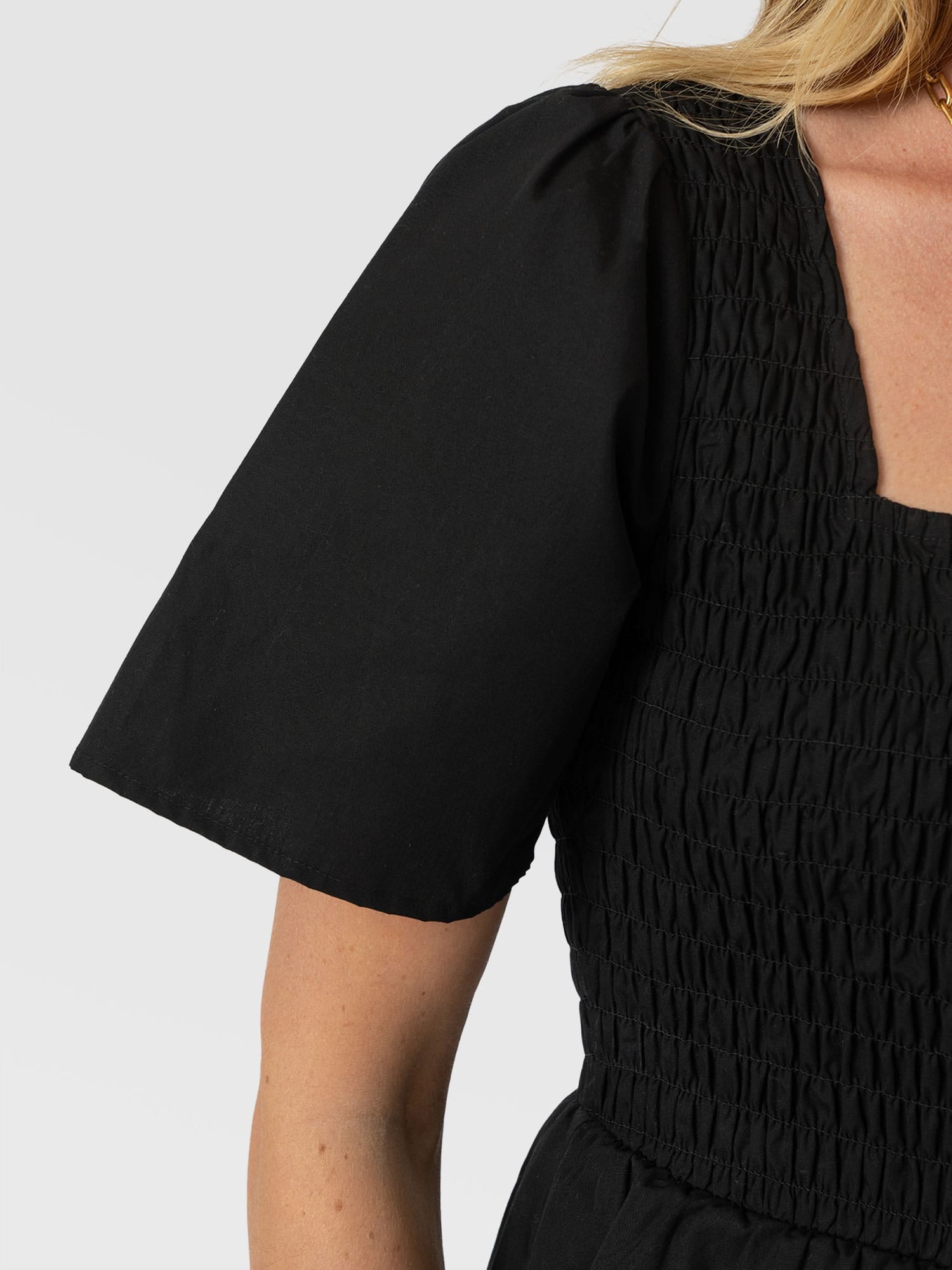 Maya Shirring Peplum Top - Black - Women's T-shirts | Saint + Sofia® USA