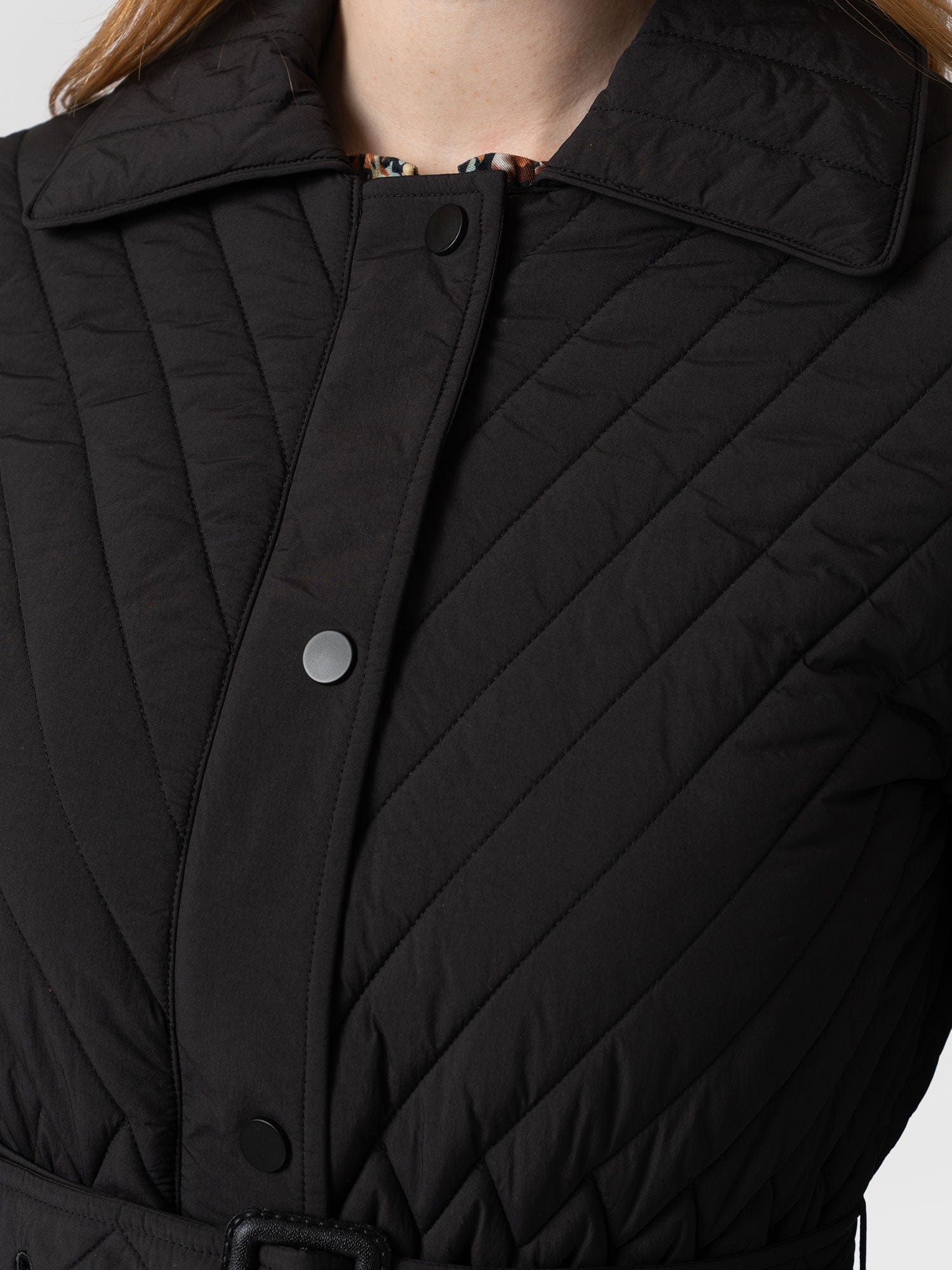 Ladies black quilted on sale coat