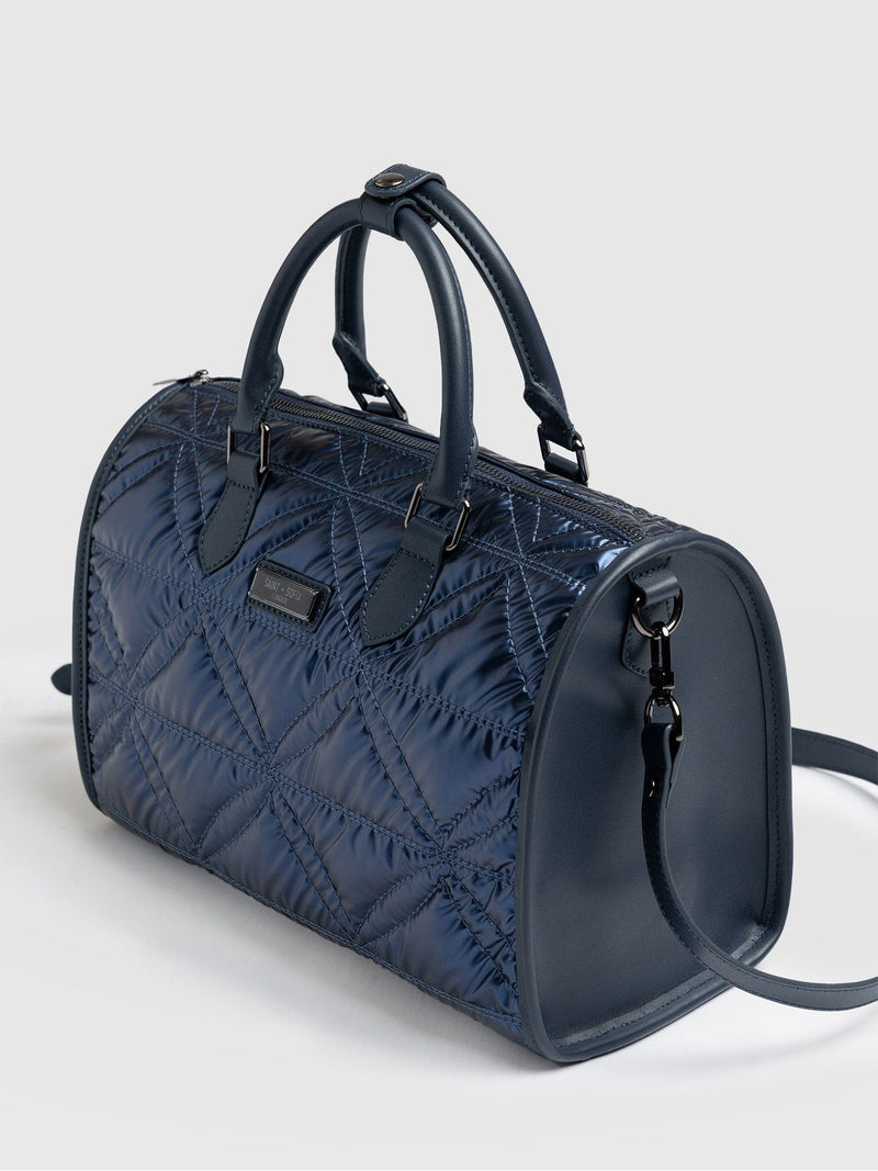 Quilted Maeve Duffle Bag Metallic Navy - Women's Bags | Saint + Sofia® UK