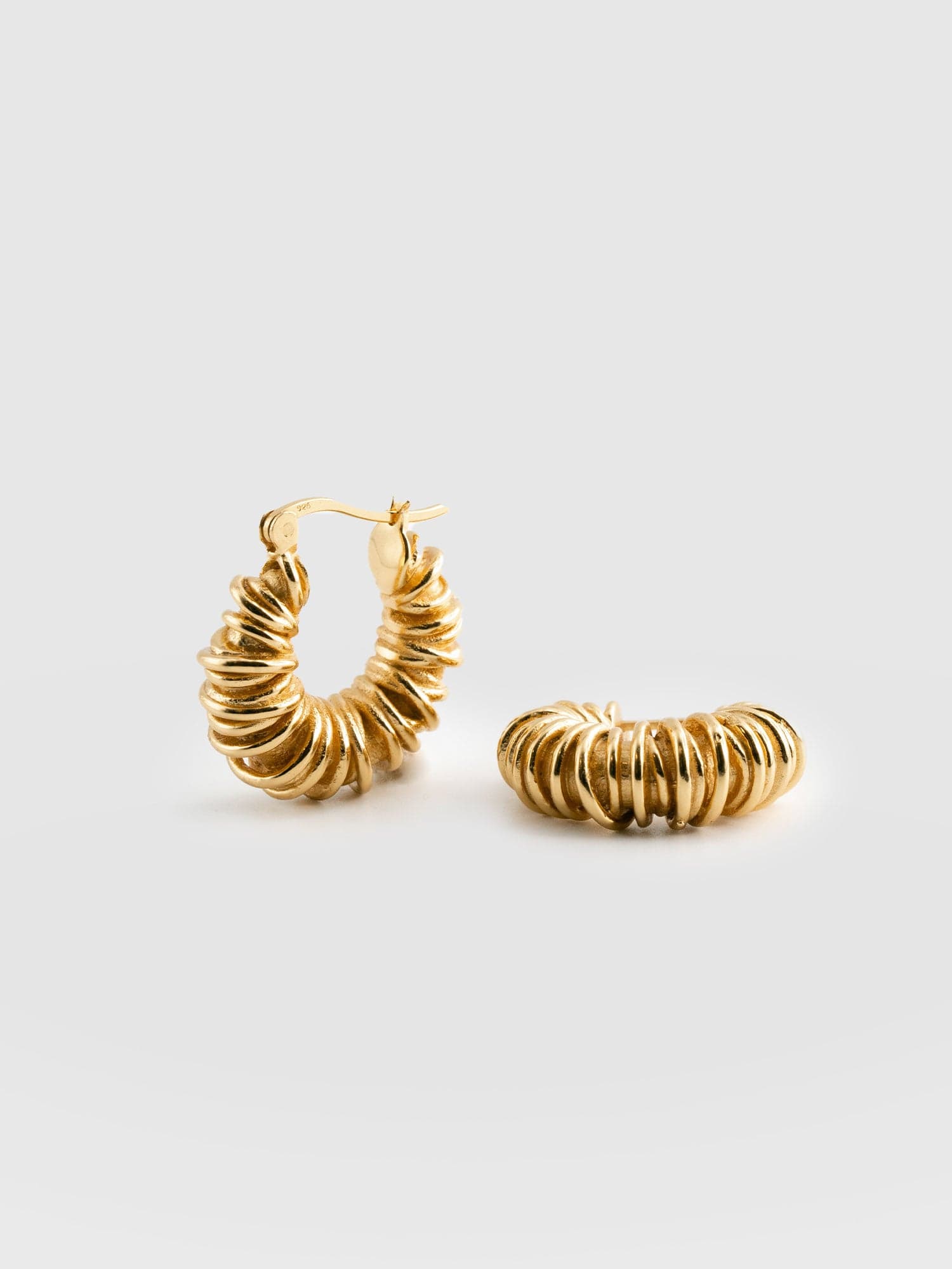 Gold swirl shop hoop earrings