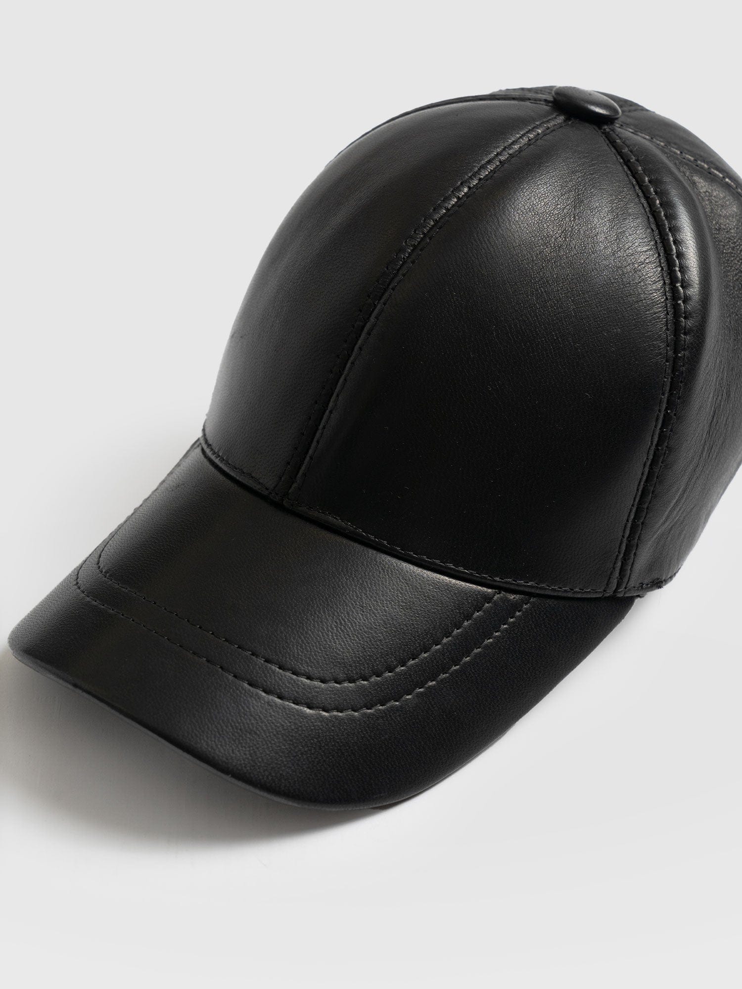 Ladies black hot sale leather cap