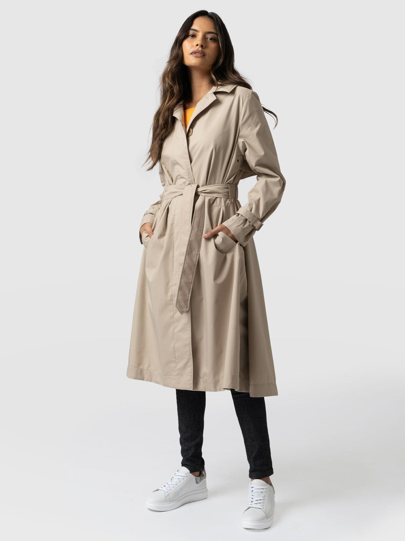 https://saintandsofia.com/cdn/shop/products/waterproof-a-line-trench-coat-beige-women-s-overcoats-saint-sofia-usa-31836556558513.jpg?v=1661515797&width=800